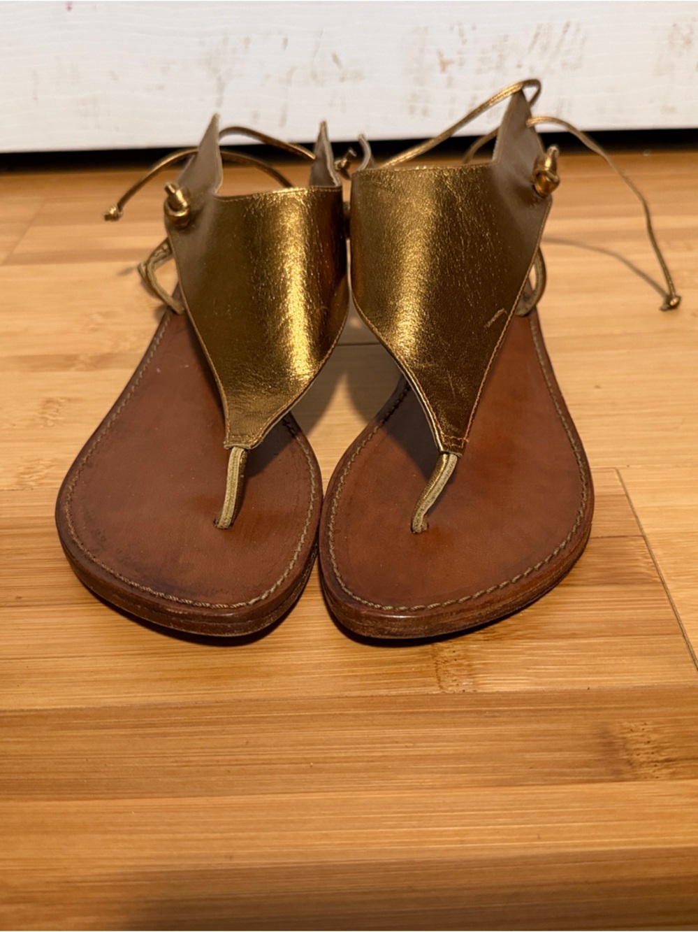 Metallic Gold Leather T-Strap Sandals - Women